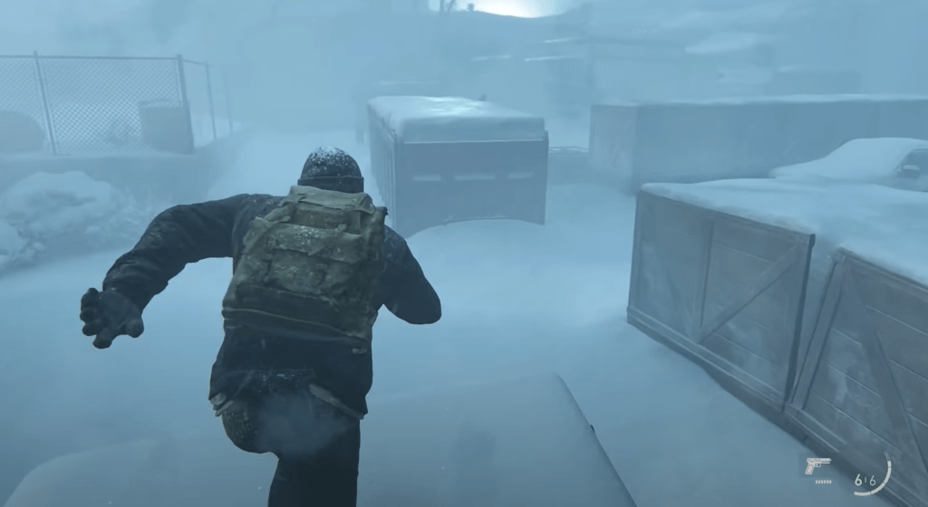 A women running away from a horde of enemies in snow.